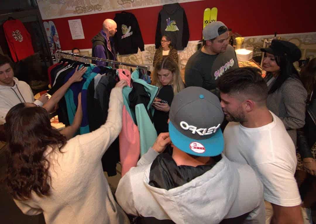 Crew browsing through Slug Skis gear